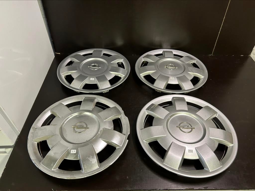 4 enjoliveurs Opel corsa astra combo 14", Autos : Divers, Enjoliveurs, Utilisé, Enlèvement ou Envoi