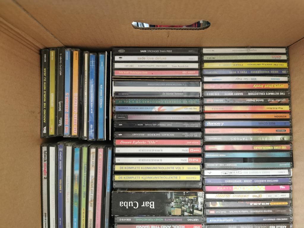 Lot 500 cd's en glazen cd rek, Ophalen