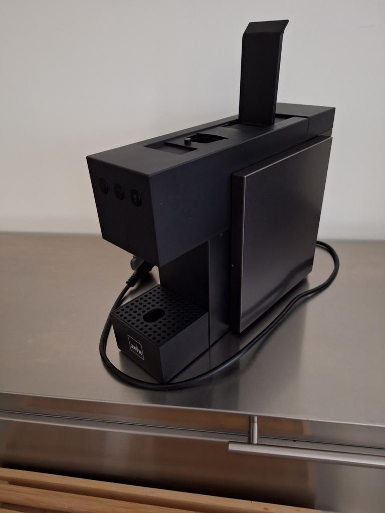 Koffiemachine met capsules, Ophalen