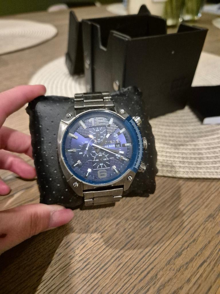 Horloge diesel, Ophalen, Zo goed als nieuw, Polshorloge, Staal