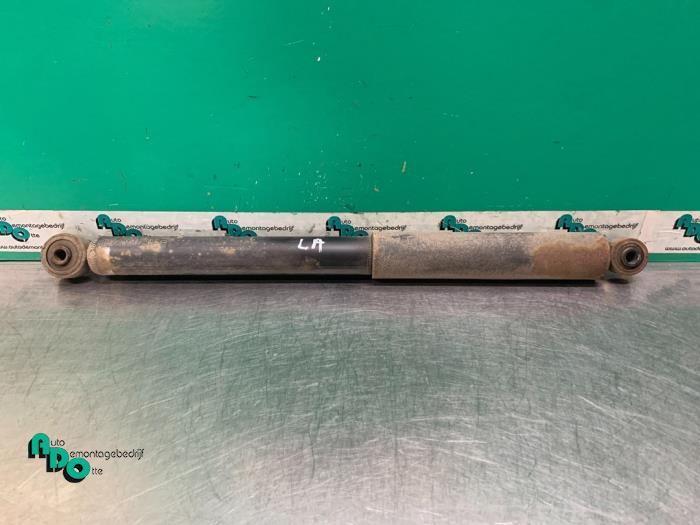 Amortisseur arrière gauche d'un Daihatsu Cuore (Cuore 03-), Daihatsu, -, 3 mois de garantie, Utilisé