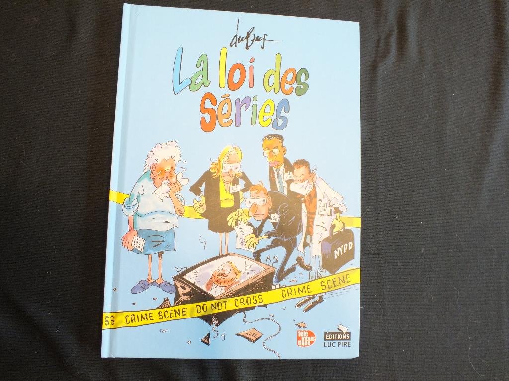 LA LOI DES SERIES (1 ALBUM EO).  EDITIONS LUC PIRE, Une BD, Enlèvement ou Envoi, Comme neuf, DuBus