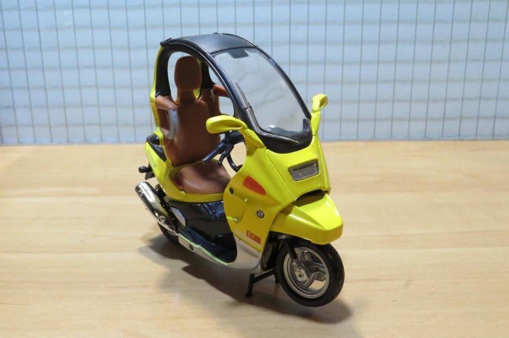 BMW C1 1:18 yellow blister, Hobby en Vrije tijd, Modelauto's | 1:18, Ophalen of Verzenden, Nieuw, Motor, Motormax