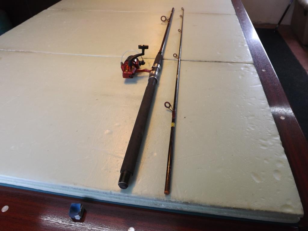 een hengel van ARCA met molen op, Ophalen, Gebruikt, Werphengel