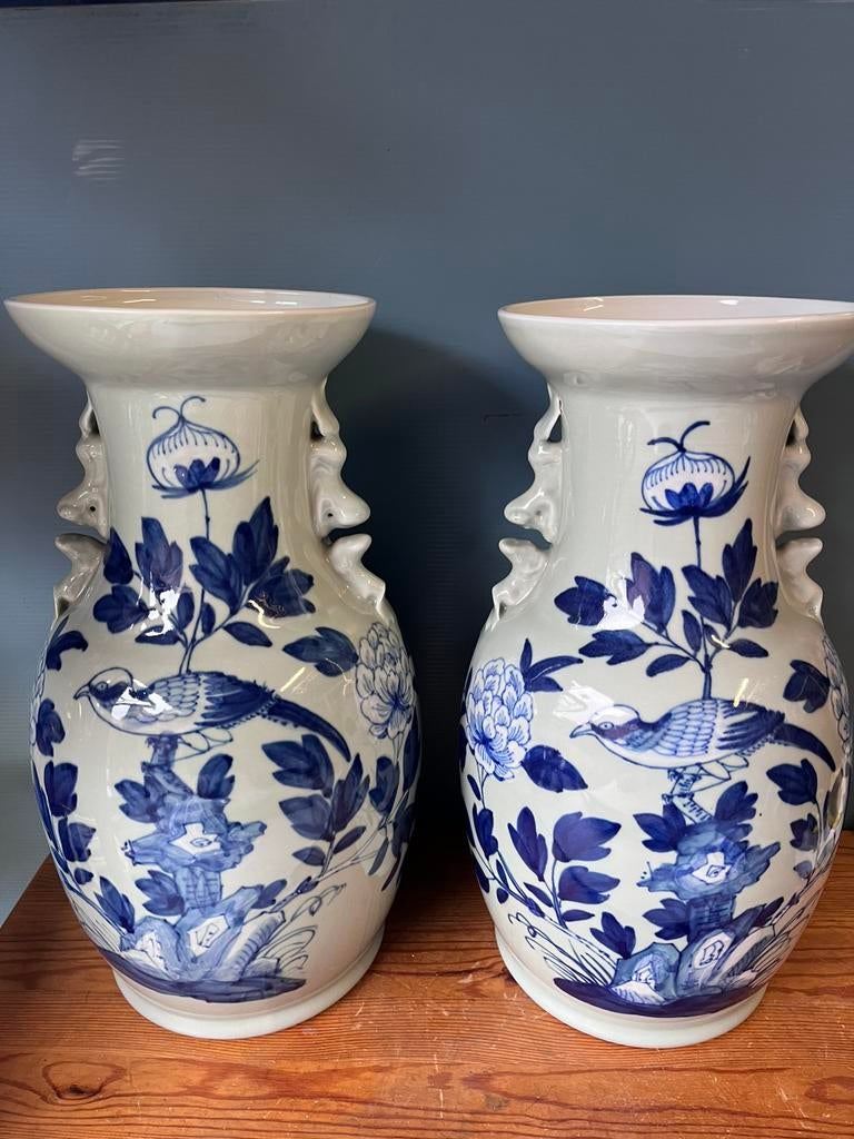 Chinese blauw wit vazen, Ophalen