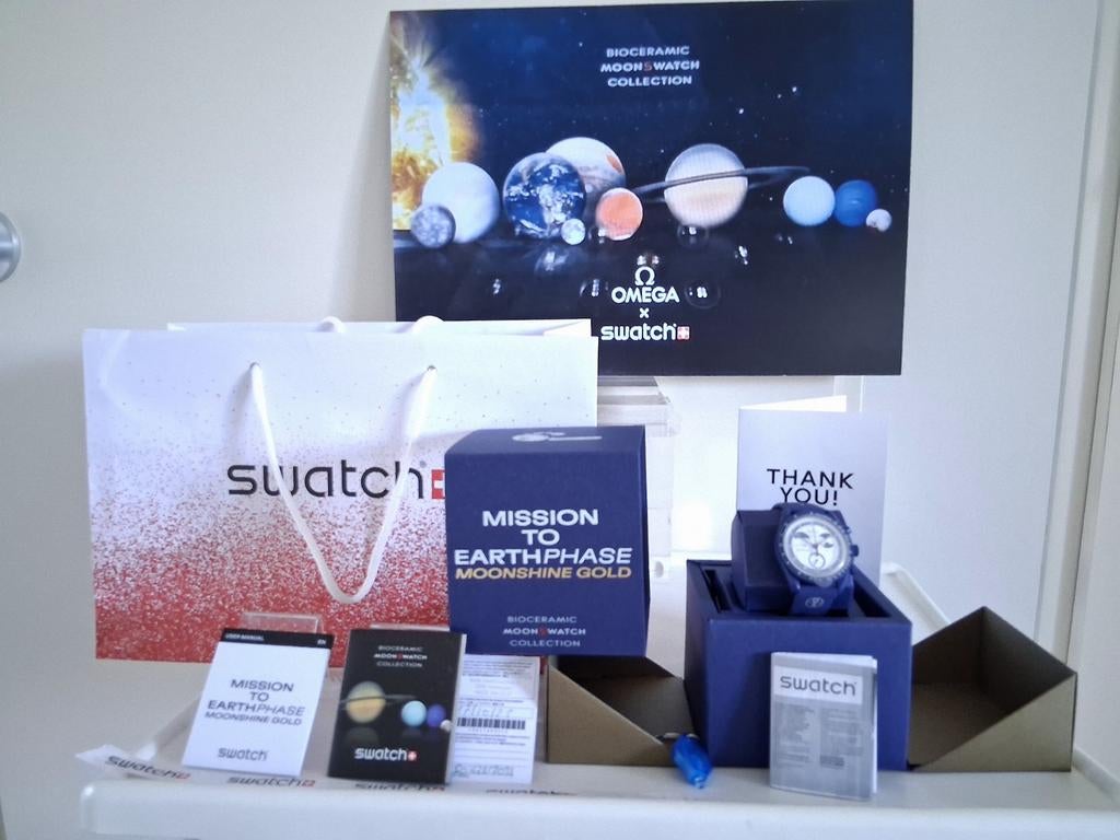 Mission OMEGA x SWATCH en phase terrestre - Moonshine Gold, Enlèvement ou Envoi, Autres matériaux, Neuf, Montre-bracelet