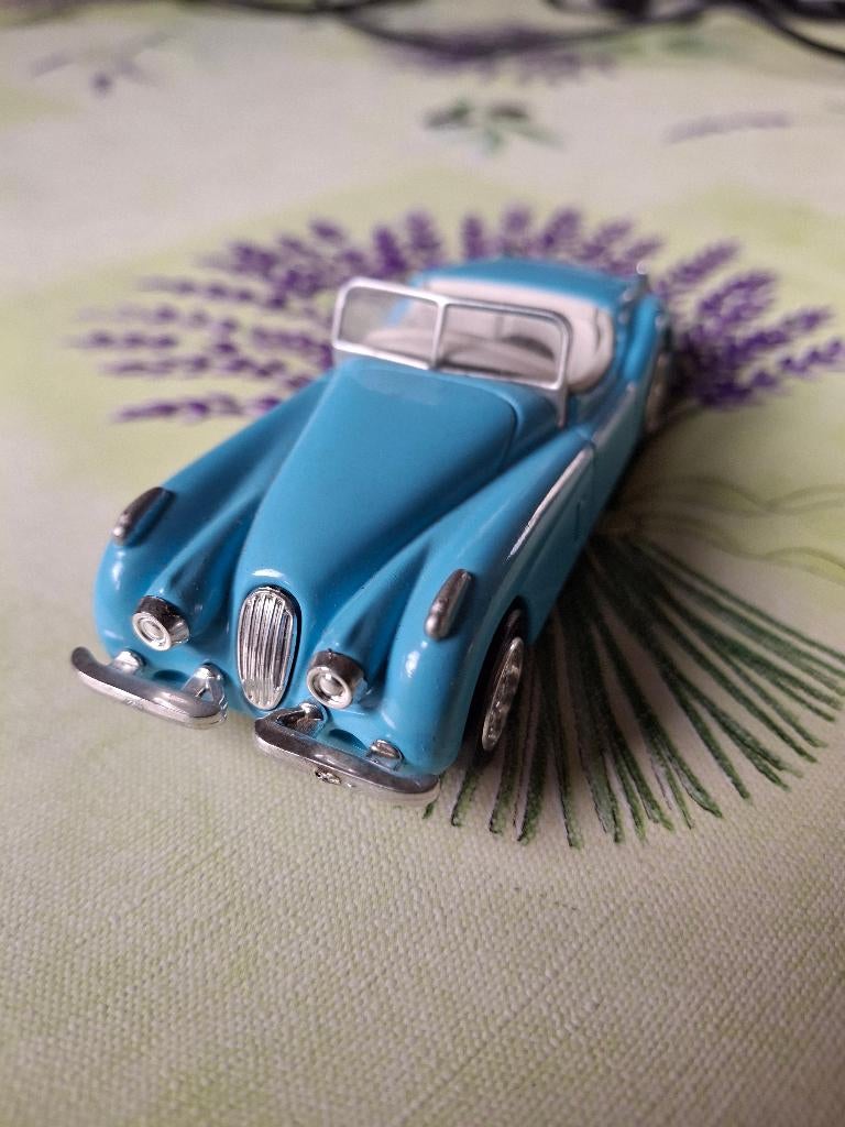 Jaguar XK 120 Roadster Licht blauw (New Ray), Hobby en Vrije tijd, Modelauto's | 1:43, Ophalen of Verzenden, Nieuw, Auto, Overige merken
