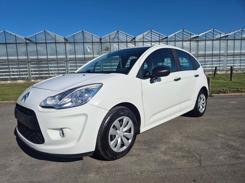 Citroen C3 1.1 benzine 50dkm bj 2012 wordt Gekeurd Vvk, Auto's, Euro 5, Stof, Zwart, 4 cilinders