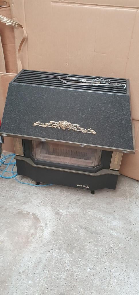 Poêle à charbon à l'état neuf, Enlèvement