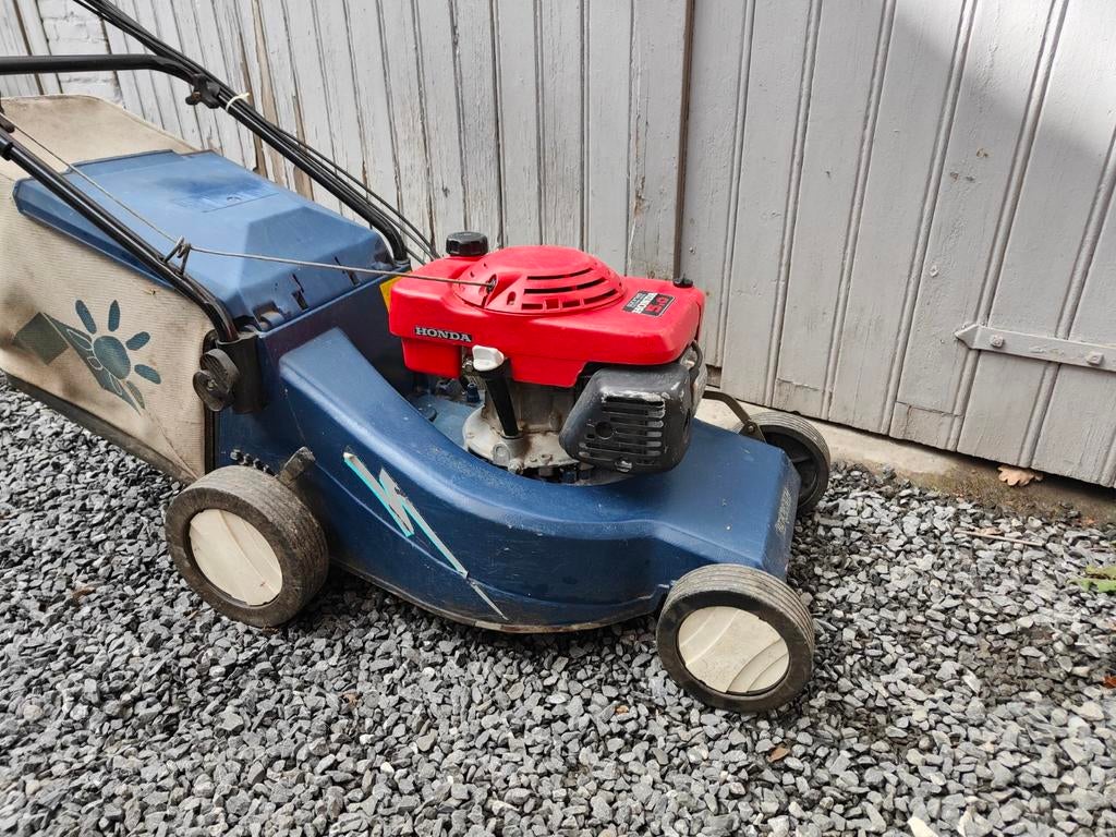 Benzinemaaier met Honda GVX 140 motor, Ophalen