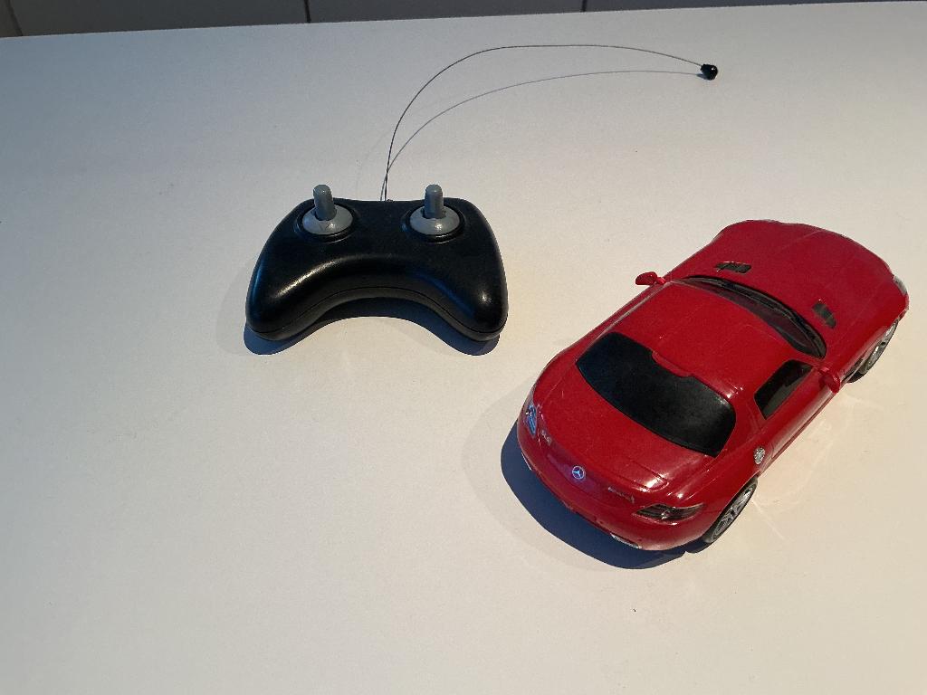 Mercedes SLS  AMG Rood, Ophalen of Verzenden, Zo goed als nieuw, Auto