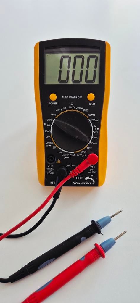 Meettoestel met meetsnoeren., Ophalen