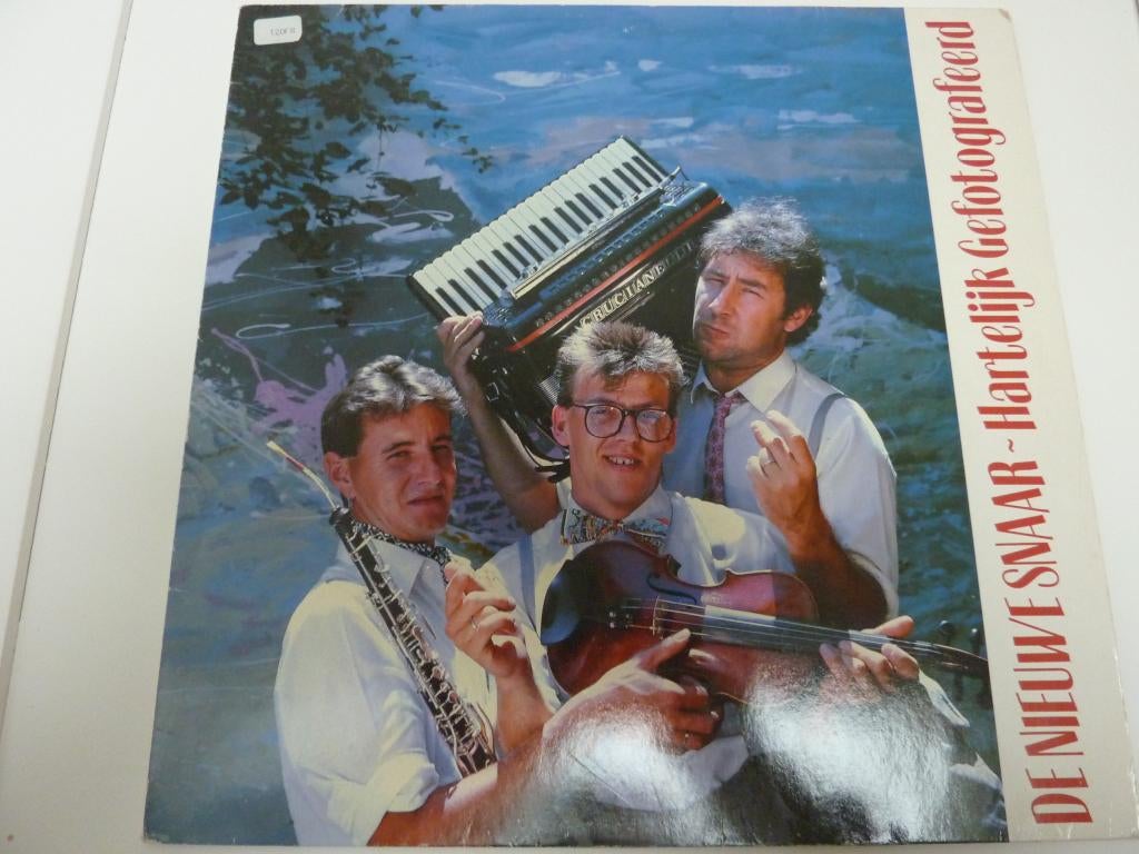 De Nieuwe Snaar - Hartelijk Gefotografeerd, Ophalen of Verzenden, Zo goed als nieuw