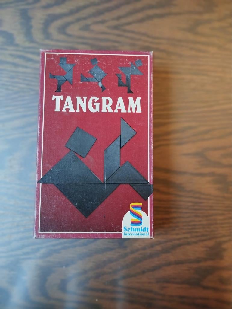 Tangram in originele doos+spelregels en verbetersleutel, Een of twee spelers, Ophalen of Verzenden, Zo goed als nieuw, Schmidt International