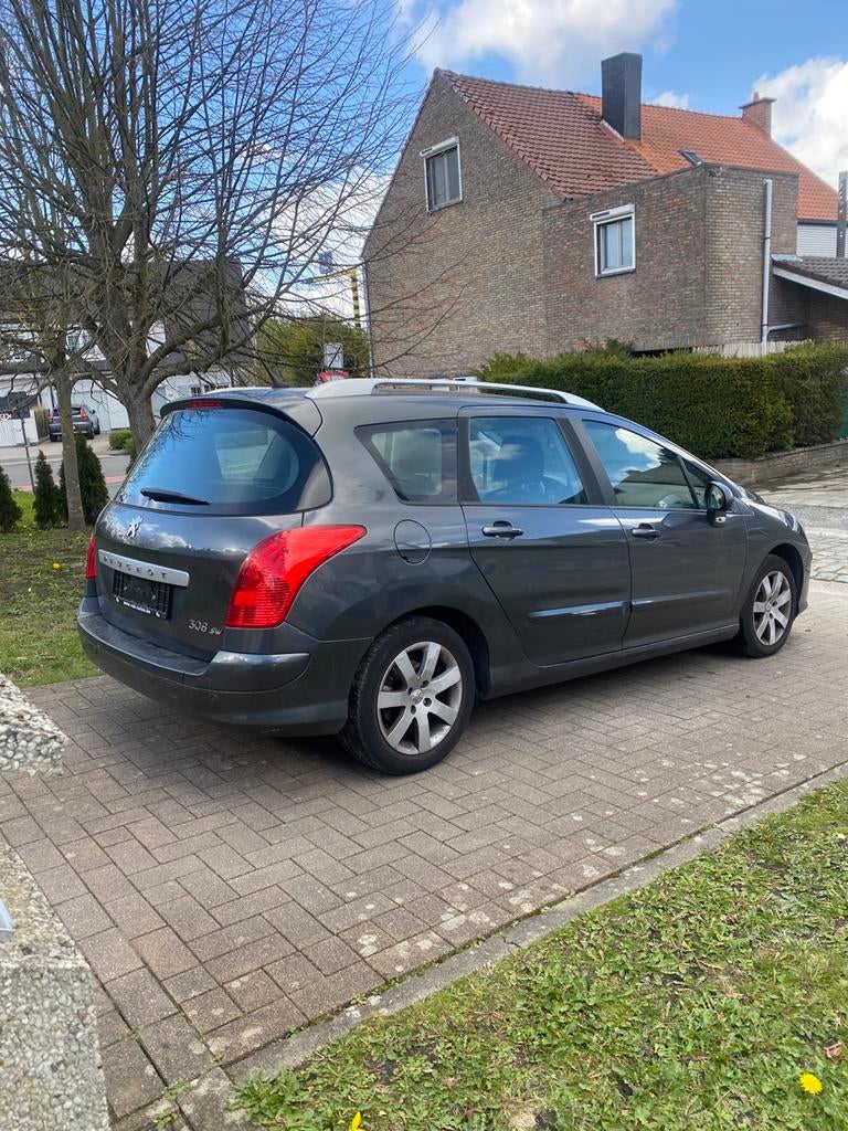 ️ description ️ Peugeot 308  essence 1.4 automatique 59012km, Auto's, Automaat, Euro 5, Break, Grijs