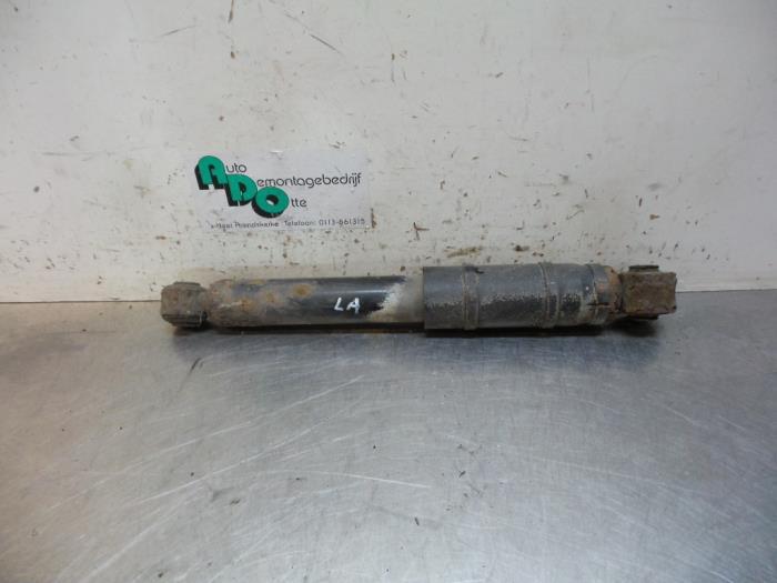 Schokdemper links-achter van een Opel Combo (Combo 02-), Gebruikt, -, -, Opel