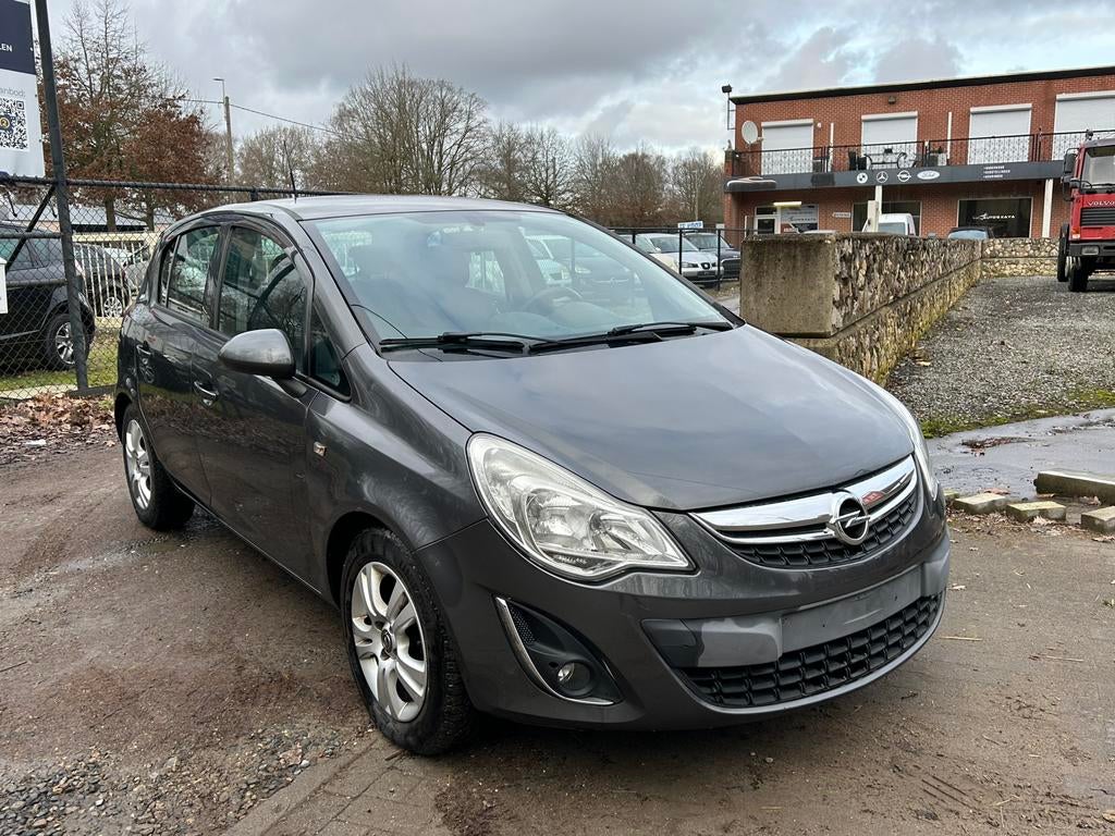 Opel corsa 1.3 diesel km 201.000 bj 2011, Auto's, Voorwielaandrijving, Stof, Zwart, 4 cilinders