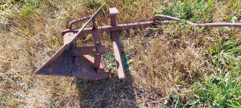 Oud werktuig...ploeg, Ophalen