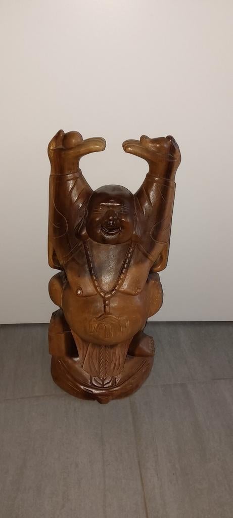 Houten boeddha, Enlèvement