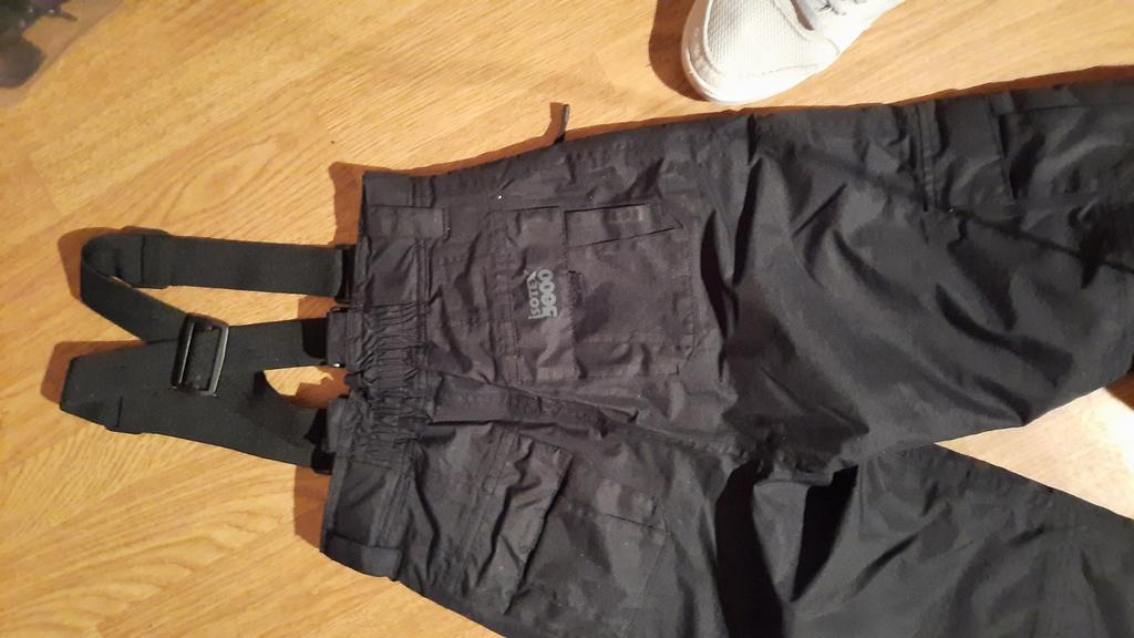 salopette de ski enfant, Ophalen