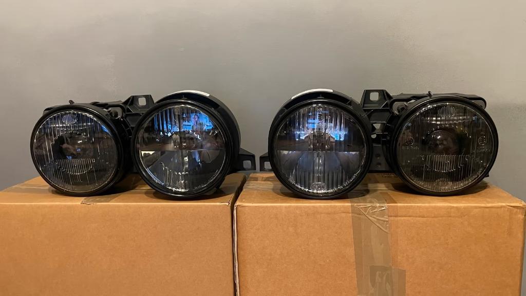 BMW E30 HELLA ZWARTE KOPLAMP BMW ONDERDEEL ZEER ZELDZAAM ORI, Auto-onderdelen, Verlichting, Ophalen of Verzenden, Nieuw, BMW