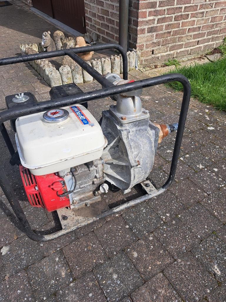 Waterpomp honda met buis, Ophalen