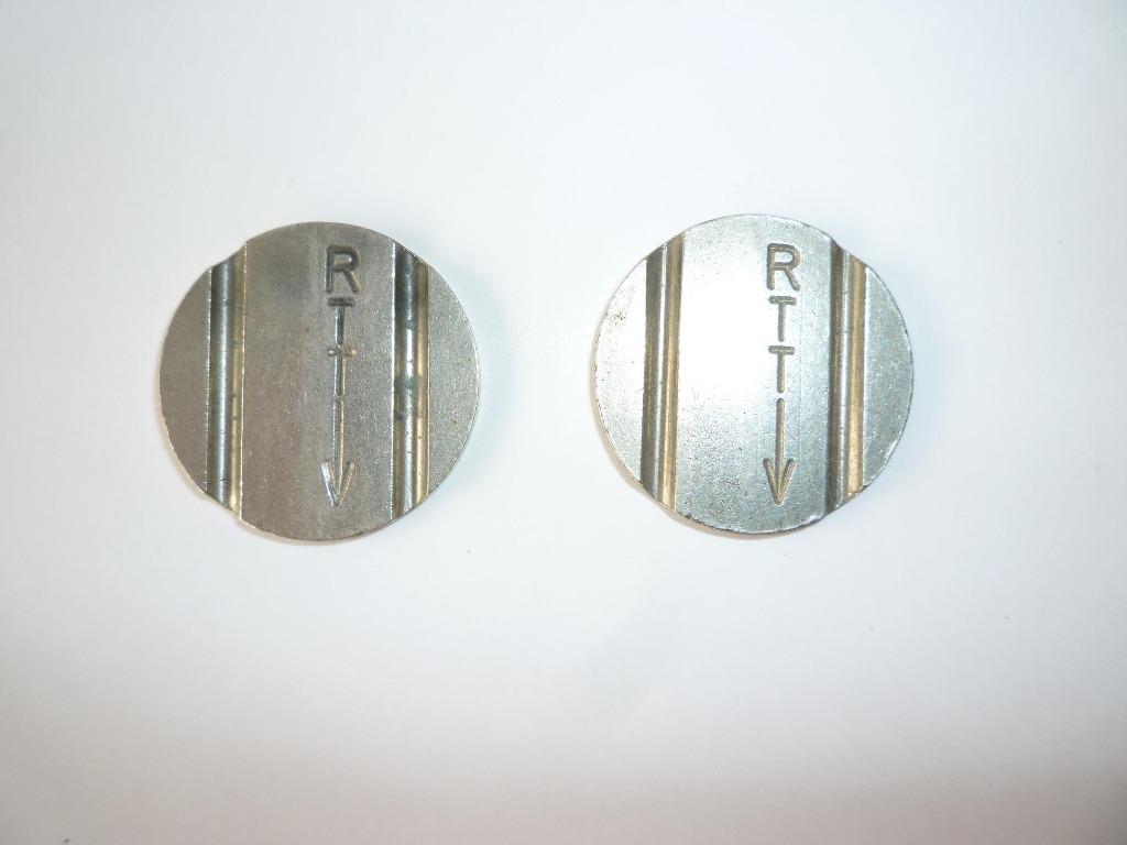 Deux anciens jetons téléphoniques RTT, Enlèvement