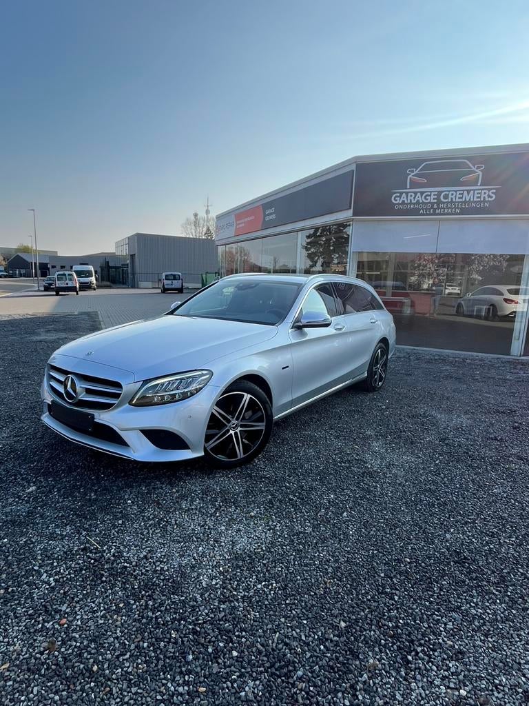 1 JAAR GARANTIE Mercedes C300de  PHEV 143kw T-9 Tronic Braek, Auto's, Automaat, Achterwielaandrijving, 4 cilinders, Leder en Stof