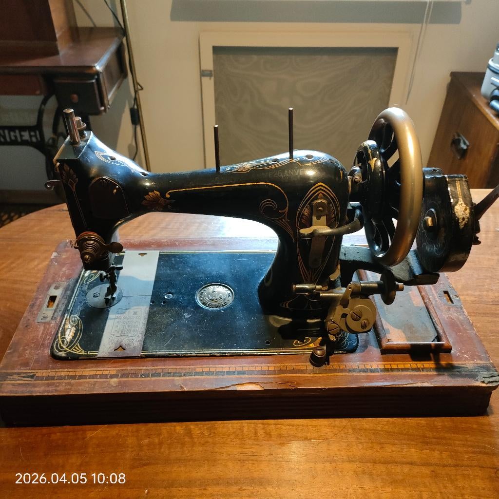 antieke handnaaimachine Anker Werke AG, Ophalen