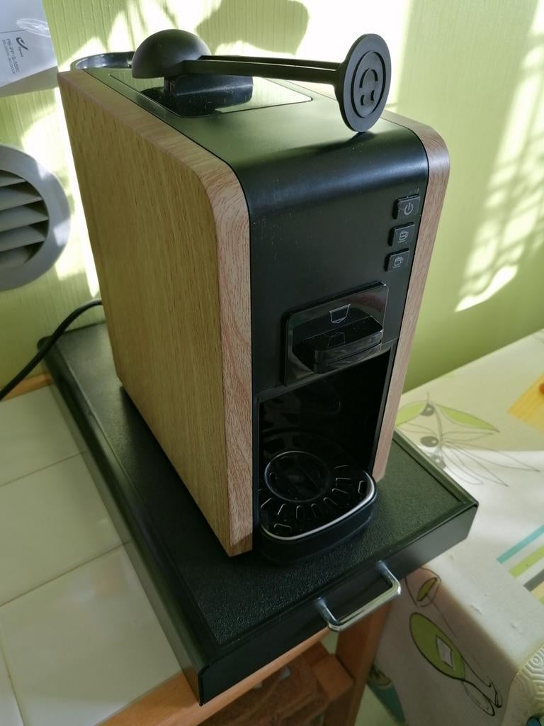 Machine à café pour différentes capsules, Enlèvement