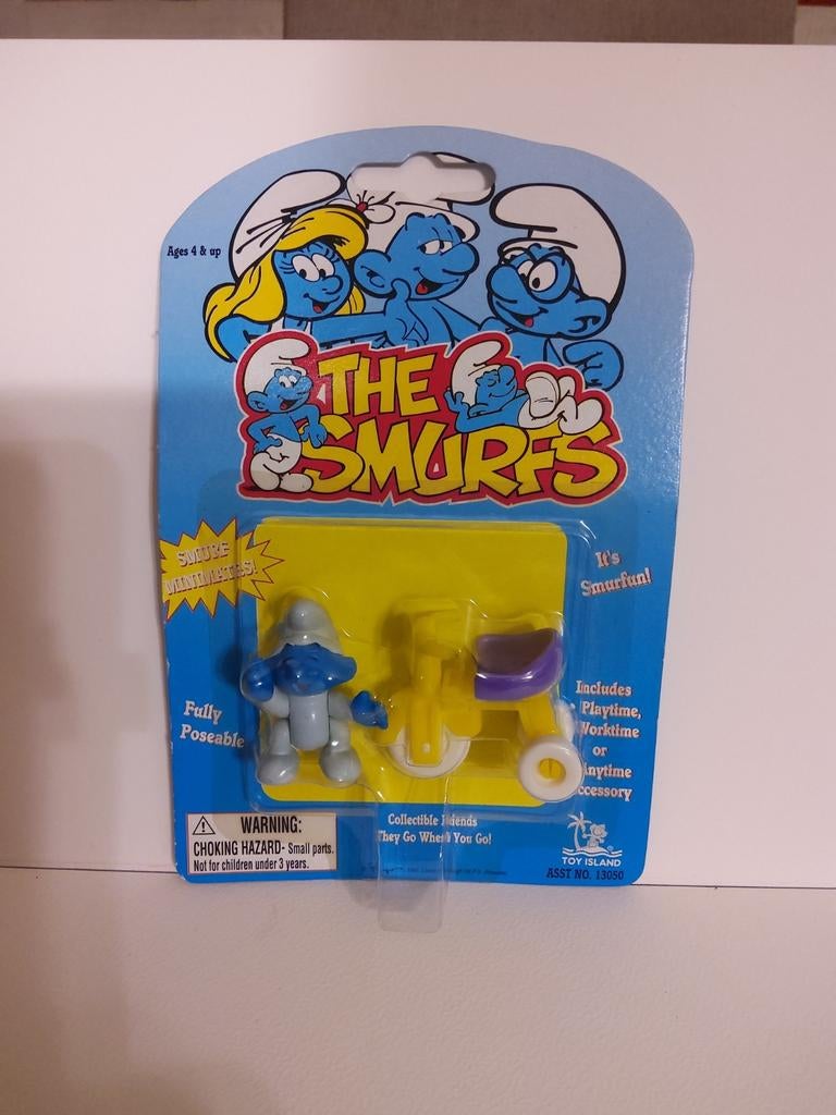 Bébé Schtroumpf avec vélo, Enlèvement ou Envoi, Neuf, Bébé Schtroumpf, Poupée, Figurine ou Peluche