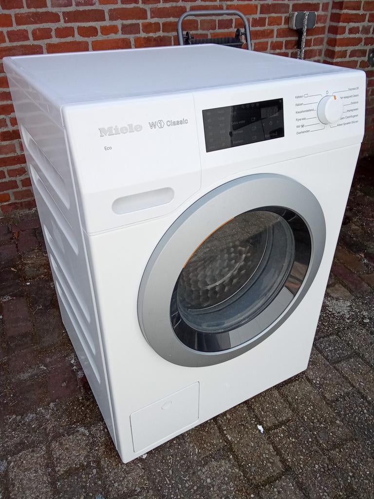 Jonge W1 Miele wasmachine, Ophalen
