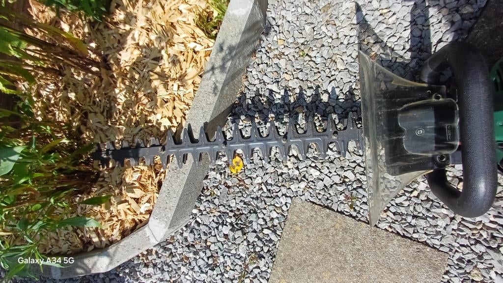 Heggensnijmachine, Ophalen