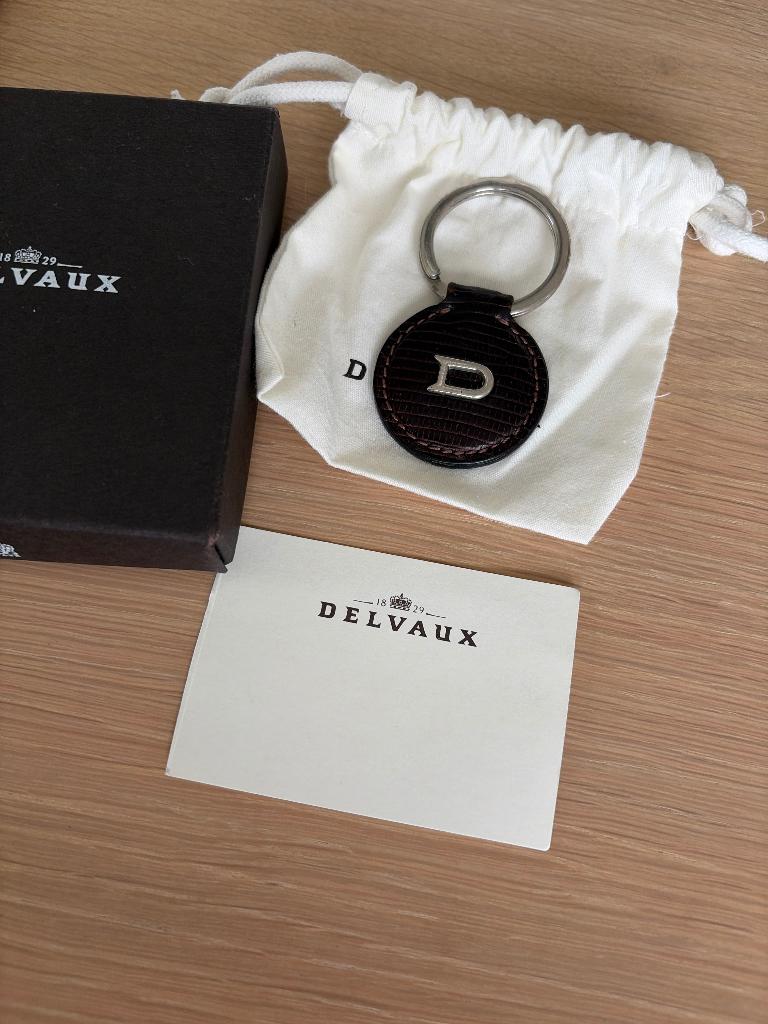 Delvaux Sleutelhanger exotisch leer, Ophalen of Verzenden, Zo goed als nieuw, Bruin, Overige typen