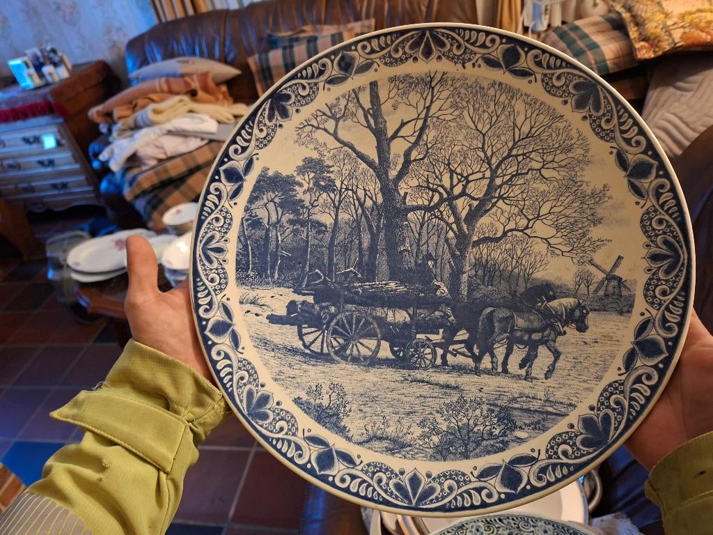 Delfs blauwe borden, Ophalen