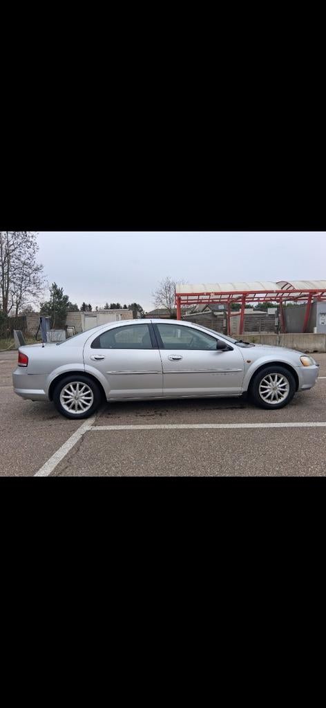 Crysler sebring 2.7 24v v6 benzine, Auto's, Chrysler, 4 deurs, Zwart, Leder, Berline