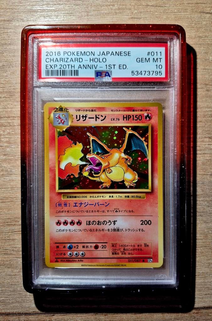 Pokémon charizard holo 20th anniv. 1st edit. japanese PSA 10, Enlèvement