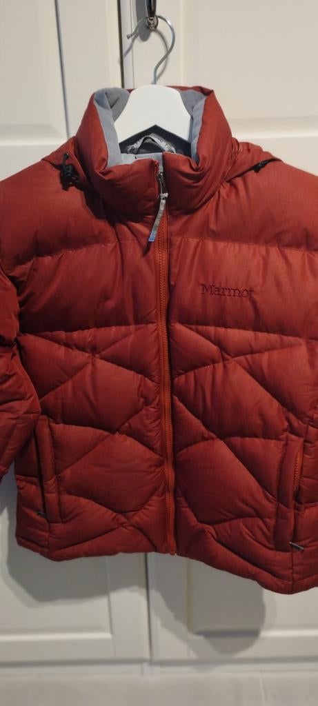 Doudoune Marmot Duvet, Enlèvement