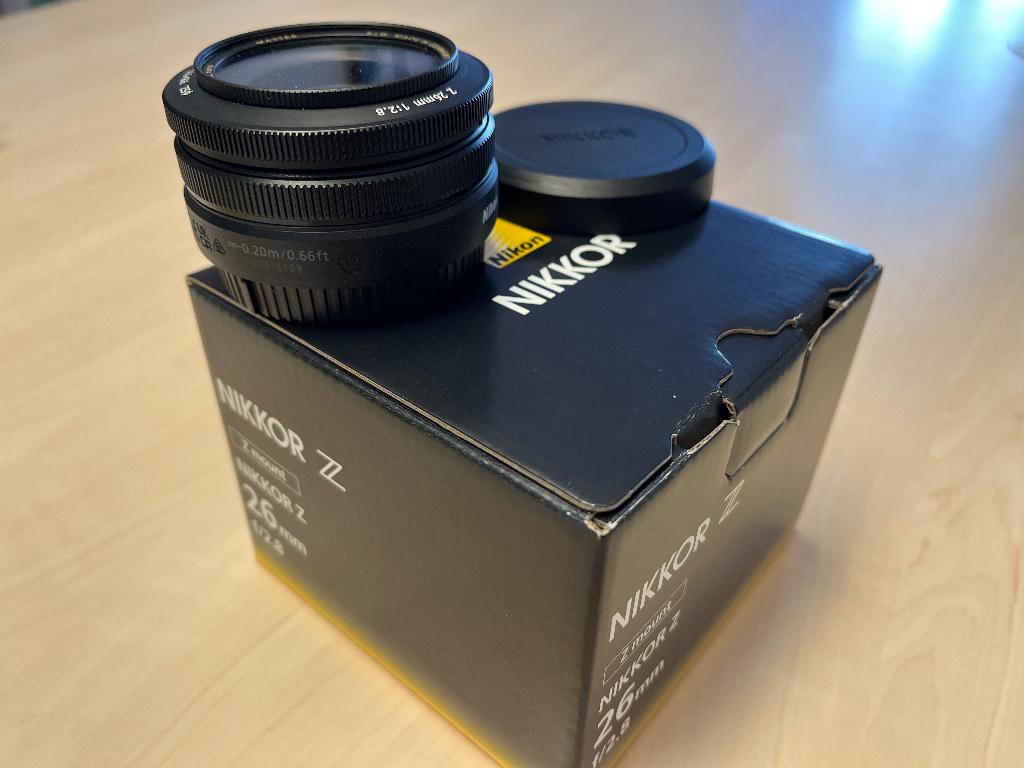 Nikon Z 26 mm f/2,8 - Nikon Z DX 12-18 mm F/3,5-5,6 PZ VR, Enlèvement, Neuf, Objectif grand angle, Zoom