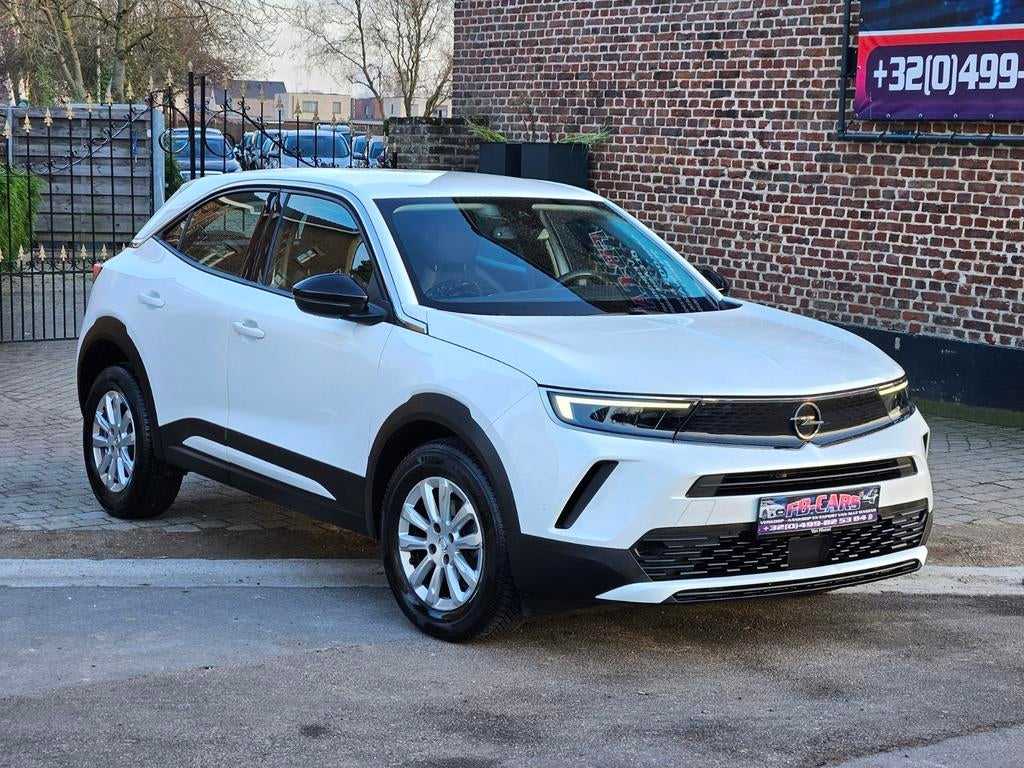 Opel Mokka 2021 Benzine 100pk/Euro 6b/60.000km/1j Garantie, Auto's, Stof, 4 cilinders, Wit, 5 deurs