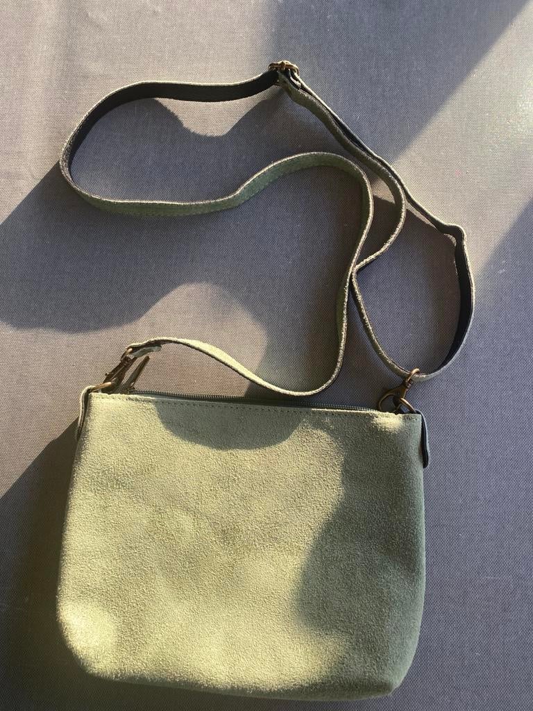 Handtas, Ophalen, Zo goed als nieuw