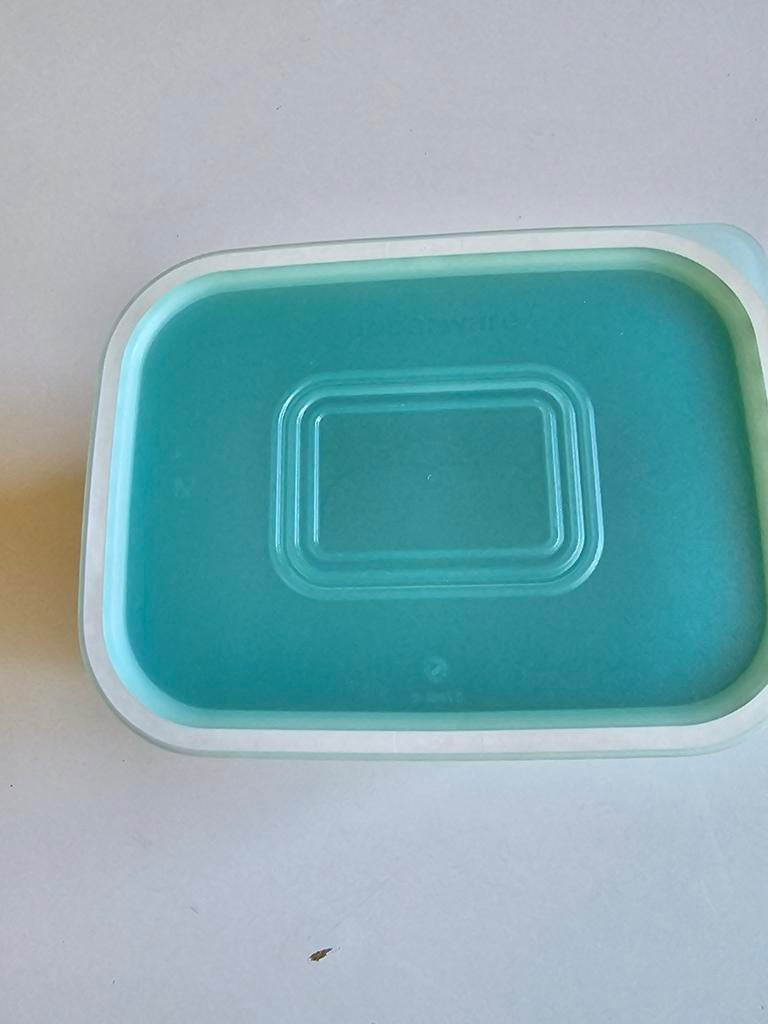 Tuperware koffie houder, Ophalen