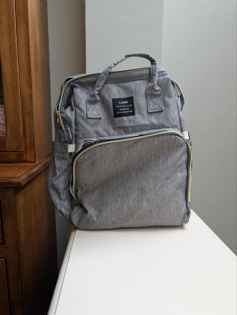 Luiertas met babybed, Ophalen