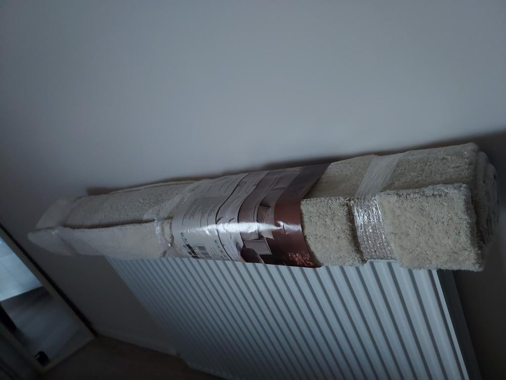 NIEUWE TAPIJT !!, Ophalen