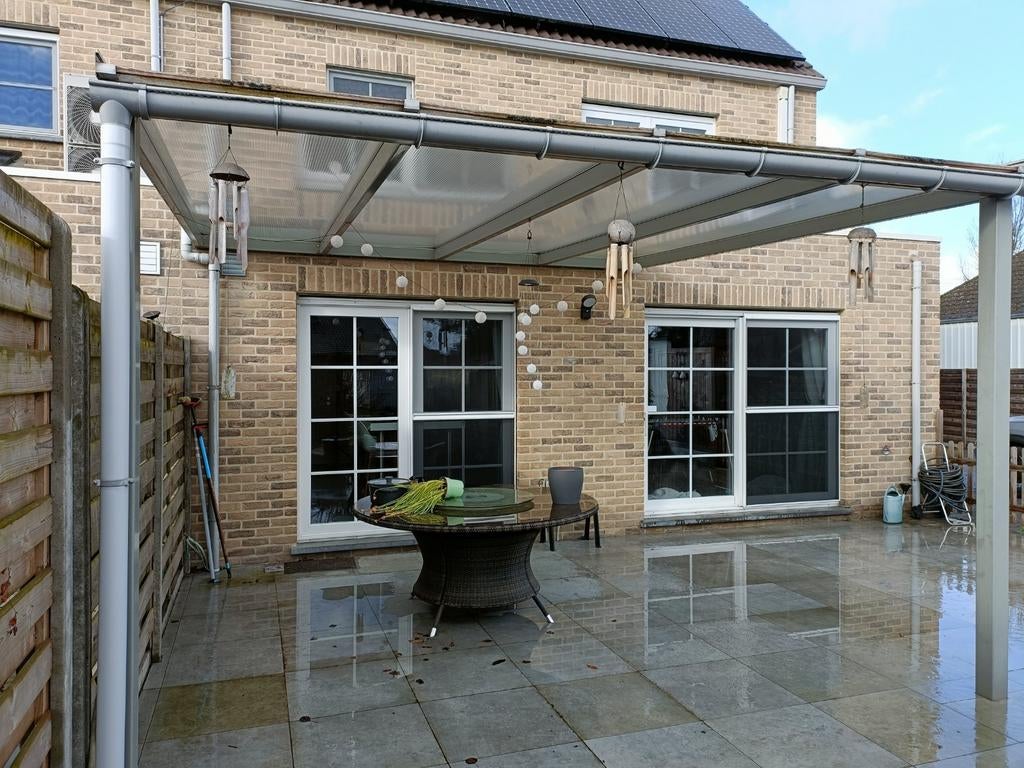 Stalen terras overkapping van 4 op 4, Ophalen