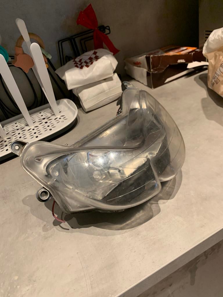Optique phare avant MBK/YAMAHA Nitro avant 2012, Enlèvement