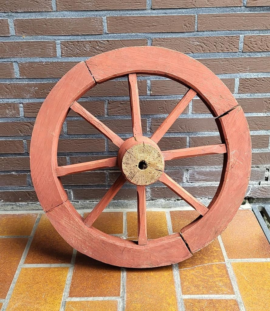 Oud kruiwagenwiel, Ophalen