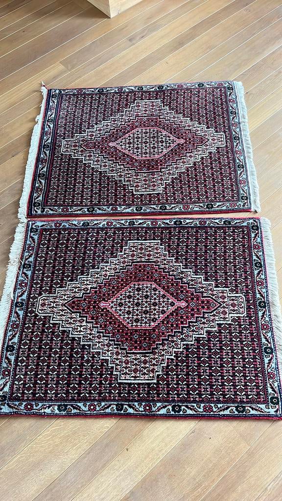 Tweelingtapijten . Oorsprong Iran, Ophalen