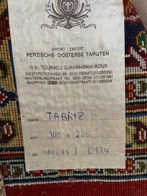 handgeknoopt Perzisch tapijt, Ophalen