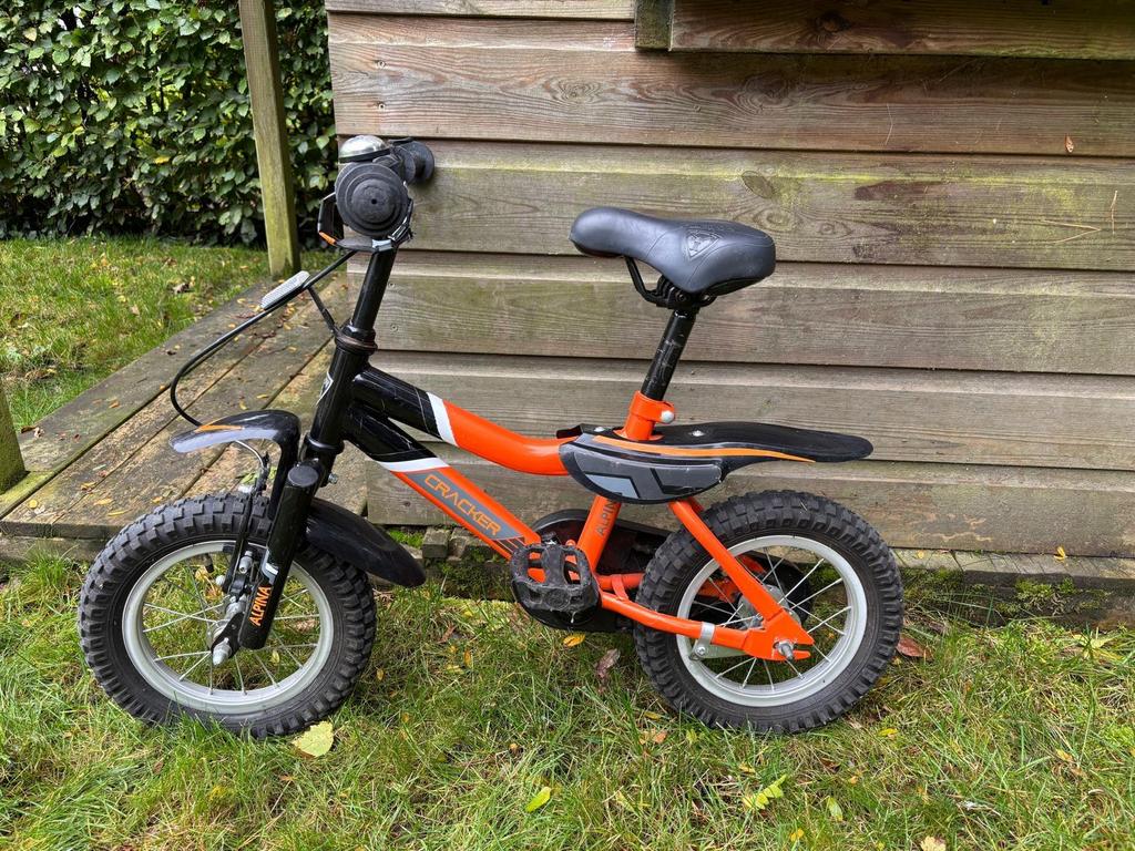 Oranje kinderfiets Cracker 12 inch + zijwieltjes, Fietsen en Brommers, Fietsen | Kinderfietsjes, Ophalen, Gebruikt, Minder dan 16 inch